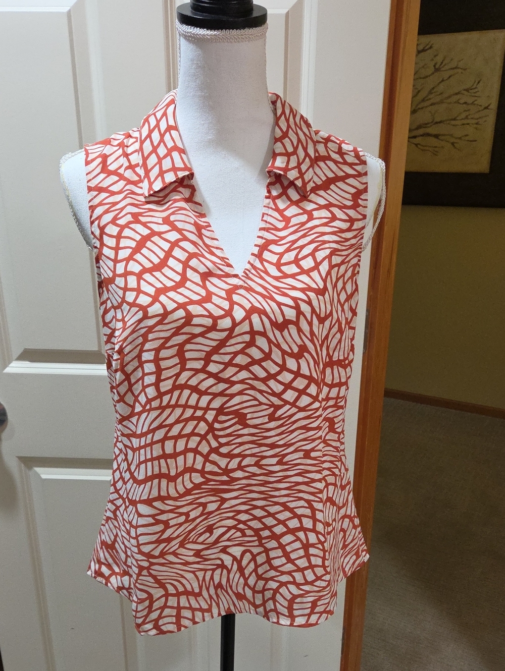 CAbi Twirl Top Sleeveless Collared V-Neck Top in Russet & Ivory Abstract Print